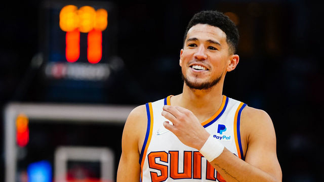 HOUSTON, TX - NOVEMBER 14: Devin Booker #1 of the Phoenix Suns smiles during the game against the Houston Rockets at Toyota Center on November 14, 2021 in Houston, Texas. NOTE TO USER: User expressly acknowledges and agrees that, by downloading and/or using this Photograph, user is consenting to the terms and conditions of the Getty Images License Agreement.