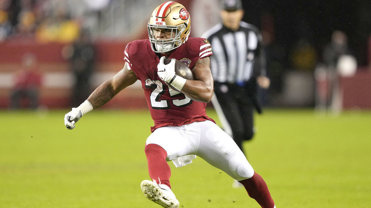 SANTA CLARA, CALIFORNIA - OCTOBER 24: Eli Mitchell #25 of the San Francisco 49ers carries the ball against the Indianapolis Colts during the first quarter at Levi's Stadium on October 24, 2021 in Santa Clara, California.