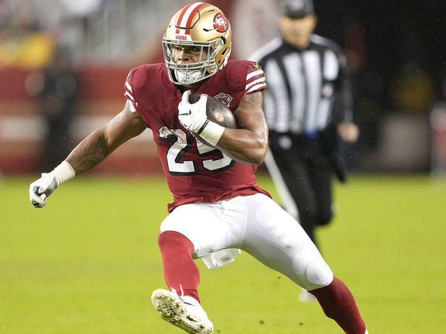 SANTA CLARA, CALIFORNIA - OCTOBER 24: Eli Mitchell #25 of the San Francisco 49ers carries the ball against the Indianapolis Colts during the first quarter at Levi's Stadium on October 24, 2021 in Santa Clara, California.