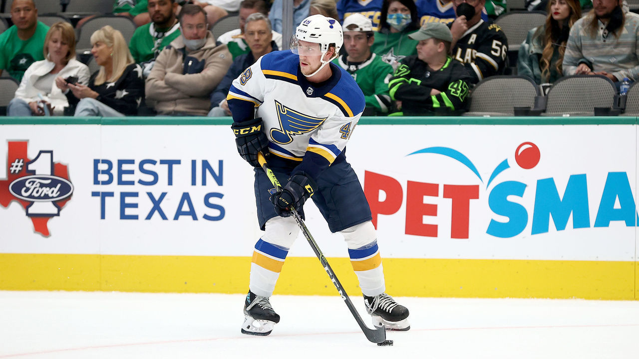 DALLAS, TEXAS - OCTOBER 05: Scott Perunovich #48 of the St. Louis Blues controls the puck against the Dallas Stars in the second period at American Airlines Center on October 05, 2021 in Dallas, Texas.