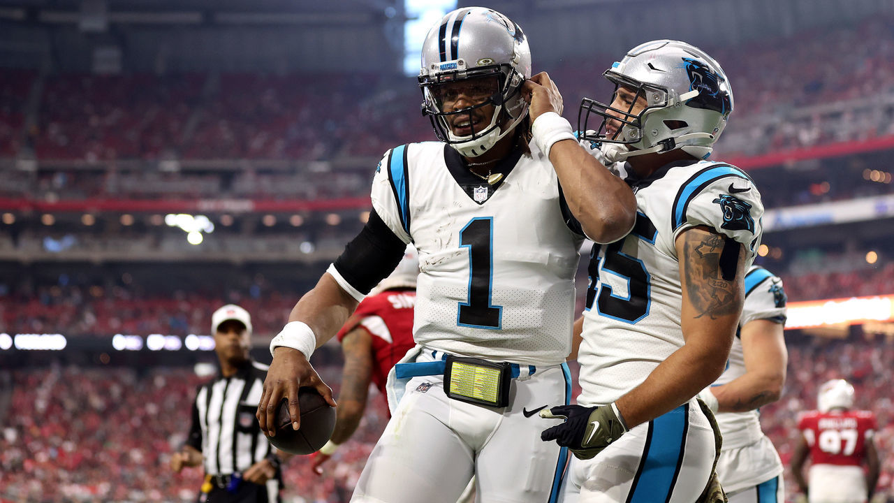 GLENDALE, ARIZONA - NOVEMBER 14: Cam Newton #1 of the Carolina Panthers reacts after scoring on a rushing touchdown against the Arizona Cardinals in the first quarter at State Farm Stadium on November 14, 2021 in Glendale, Arizona.