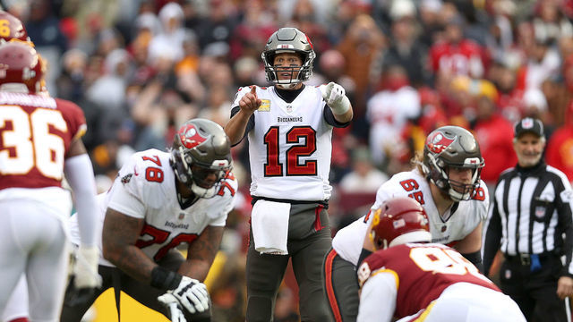 LANDOVER, MARYLAND - NOVEMBER 14: Quarterback Tom Brady #12 of the Tampa Bay Buccaneers motions from the line of scrimmage against the Washington Football Team at FedExField on November 14, 2021 in Landover, Maryland.