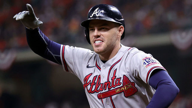 HOUSTON, TEXAS - NOVEMBER 02: Freddie Freeman #5 of the Atlanta Braves celebrates after hitting a solo home run against the Houston Astros during the seventh inning in Game Six of the World Series at Minute Maid Park on November 02, 2021 in Houston, Texas.
