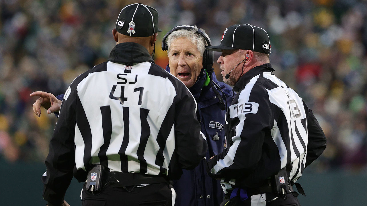 GREEN BAY, WISCONSIN - NOVEMBER 14: Head Coach Pete Carroll of the Seattle Seahawks speaks to officials during the second half against the Green Bay Packers at Lambeau Field on November 14, 2021 in Green Bay, Wisconsin.