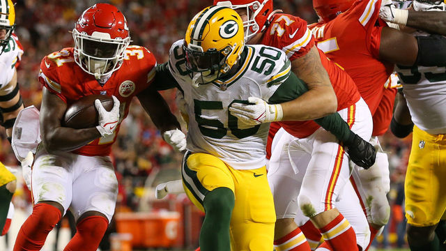 KANSAS CITY, MO - NOVEMBER 07: Green Bay Packers defensive end Whitney Mercilus (50) and Green Bay Packers defensive tackle Tyler Lancaster (95) clog the running lanes for Kansas City Chiefs running back Darrel Williams (31) in the fourth quarter of an NFL game between the Green Bay Packers and Kansas City Chiefs on Nov 7, 2021 at GEHA Field at Arrowhead Stadium in Kansas City, MO.