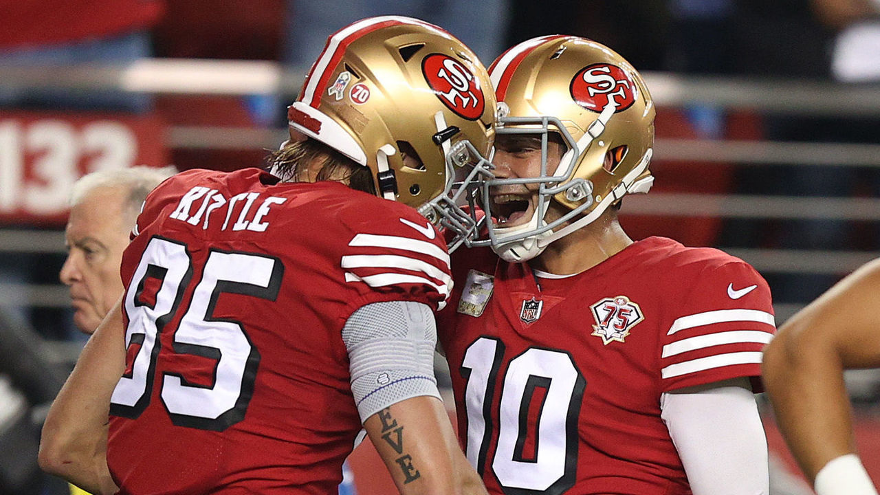 SANTA CLARA, CALIFORNIA - NOVEMBER 15: Jimmy Garoppolo #10 of the San Francisco 49ers congratulates George Kittle #85 after his touchdown in the first quarter against the Los Angeles Rams at Levi's Stadium on November 15, 2021 in Santa Clara, California.
