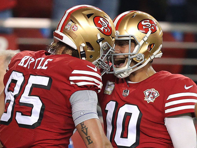 SANTA CLARA, CALIFORNIA - NOVEMBER 15: Jimmy Garoppolo #10 of the San Francisco 49ers congratulates George Kittle #85 after his touchdown in the first quarter against the Los Angeles Rams at Levi's Stadium on November 15, 2021 in Santa Clara, California.