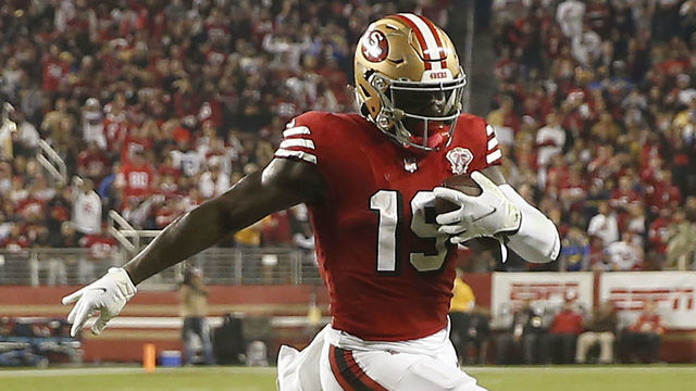 SANTA CLARA, CALIFORNIA - NOVEMBER 15: Deebo Samuel #19 of the San Francisco 49ers runs for a touchdown against Robert Rochell #31 of the Los Angeles Rams in the second quarter at Levi's Stadium on November 15, 2021 in Santa Clara, California.