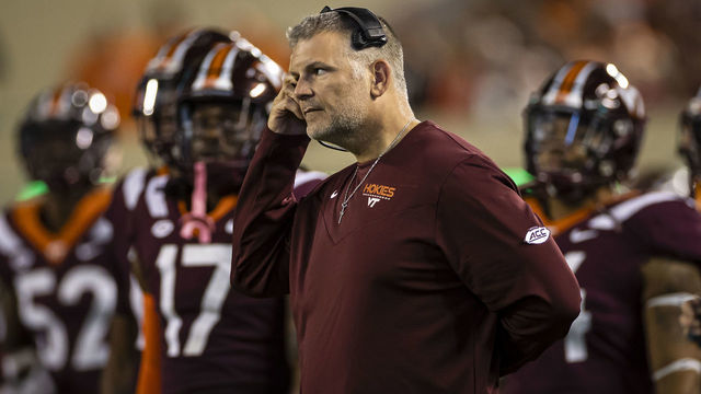 BLACKSBURG, VA - OCTOBER 09: Head coach Justin Fuente of the Virginia Tech Hokies looks on from the sidelines during the first half of the game against the Notre Dame Fighting Irish at Lane Stadium on October 9, 2021 in Blacksburg, Virginia.