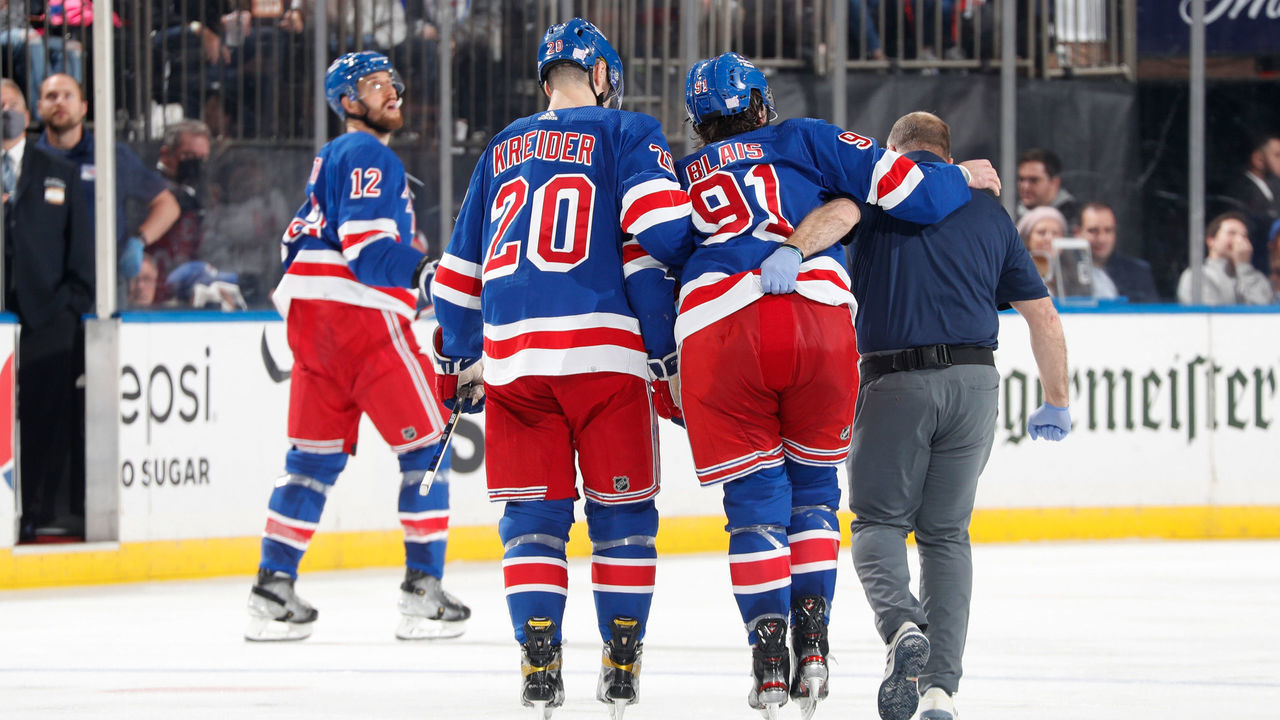 NEW YORK, NY - NOVEMBER 14: Sammy Blais #91 of the New York Rangers is helped off the ice after being injured in the game against the New Jersey Devils at Madison Square Garden on November 14, 2021 in New York City.