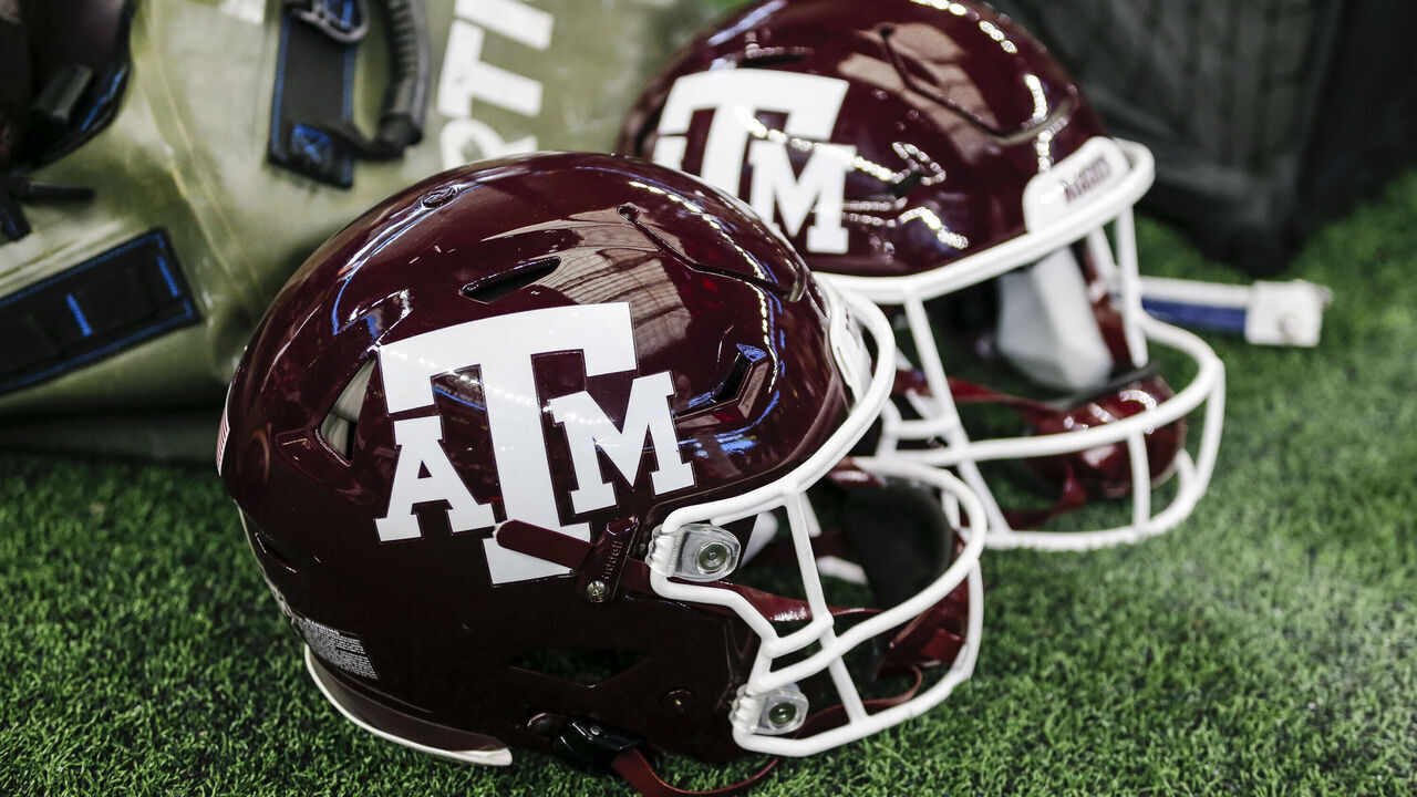ARLINGTON, TX - SEPTEMBER 25: Texas A&M Aggies helmets on the sidelines during the Southwest Classic game between the Texas A&M Aggies and the Arkansas Razorbacks on September 25, 2021 at AT&T Stadium in Arlington, Texas.