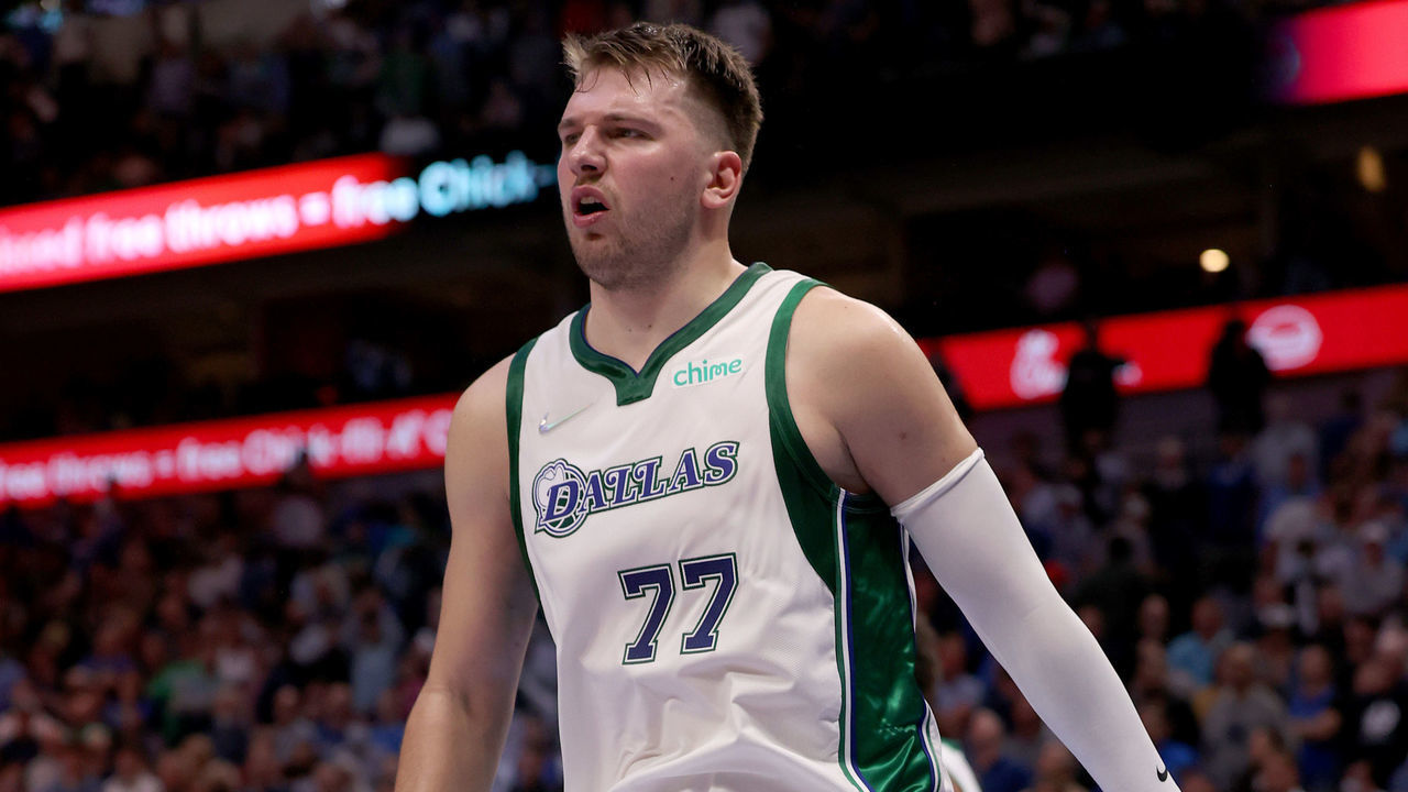 DALLAS, TEXAS - NOVEMBER 15: Luka Doncic #77 of the Dallas Mavericks limps off the court after contact against the Denver Nuggets in the fourth quarter at American Airlines Center on November 15, 2021 in Dallas, Texas.