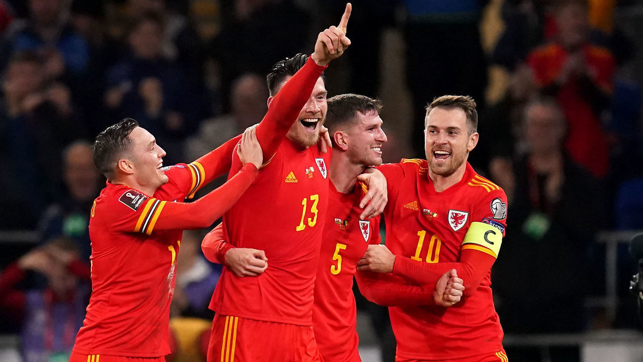 Wales' Kieffer Moore celebrates scoring their side's first goal of the game with team-mates during the FIFA World Cup Qualifying match at the Cardiff City Stadium, Cardiff. Picture date: Tuesday November 16, 2021.