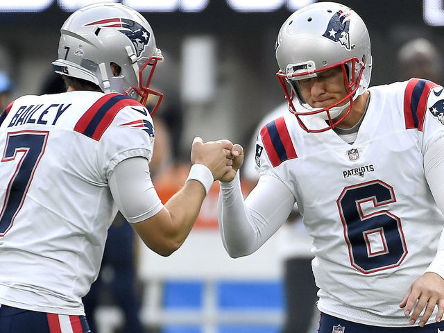 INGLEWOOD, CALIFORNIA - OCTOBER 31: Jake Bailey #7 and Nick Folk #6 of the New England Patriots celebrate after kicking a field goal in the second quarter against the Los Angeles Chargers at SoFi Stadium on October 31, 2021 in Inglewood, California.