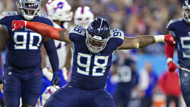 NASHVILLE, TENNESSEE - OCTOBER 18: Jeffery Simmons #98 of the Tennessee Titans celebrates after sacking the quarterback during a game against the Buffalo Bills at Nissan Stadium on October 18, 2021 in Nashville, Tennessee. The Titans defeated the Bills 34-31.