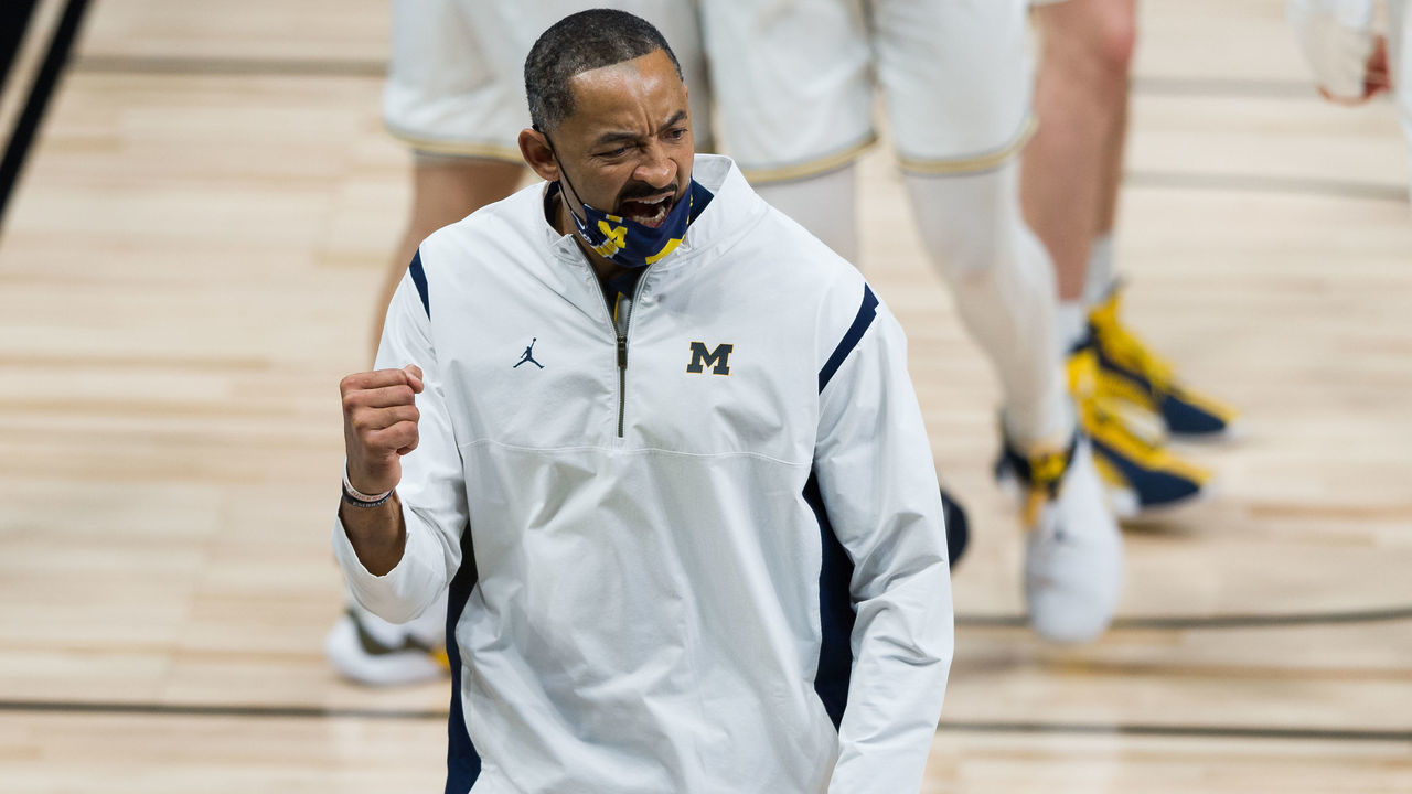 INDIANAPOLIS, IN - MARCH 12: Michigan Wolverines head coach Juwan Howard celebrates leaving the floor for halftime during the men's Big Ten tournament college basketball game between the Maryland Terrapins and Michigan Wolverines on March 12, 2021, at Lucas Oil Stadium in Indianapolis, IN.