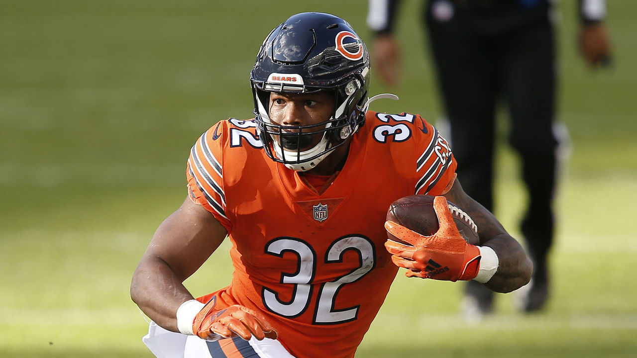 CHICAGO, IL - OCTOBER 04: Chicago Bears Running Back David Montgomery (32) looks to avoid Indianapolis Colts Cornerback Xavier Rhodes (27) during the NFL football game between the Indianapolis Colts and the Chicago Bears on October 4, 2020 at Soldier Field in Chicago, IL.