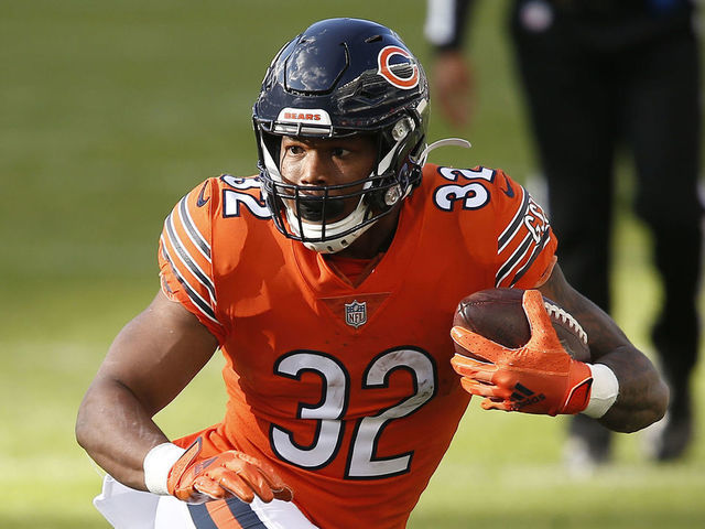 CHICAGO, IL - OCTOBER 04: Chicago Bears Running Back David Montgomery (32) looks to avoid Indianapolis Colts Cornerback Xavier Rhodes (27) during the NFL football game between the Indianapolis Colts and the Chicago Bears on October 4, 2020 at Soldier Field in Chicago, IL.