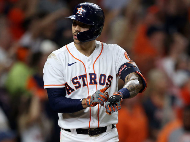HOUSTON, TEXAS - OCTOBER 15: Carlos Correa #1 of the Houston Astros points to his watch after he hit a home run in the seventh inning against the Boston Red Sox during Game One of the American League Championship Series at Minute Maid Park on October 15, 2021 in Houston, Texas.