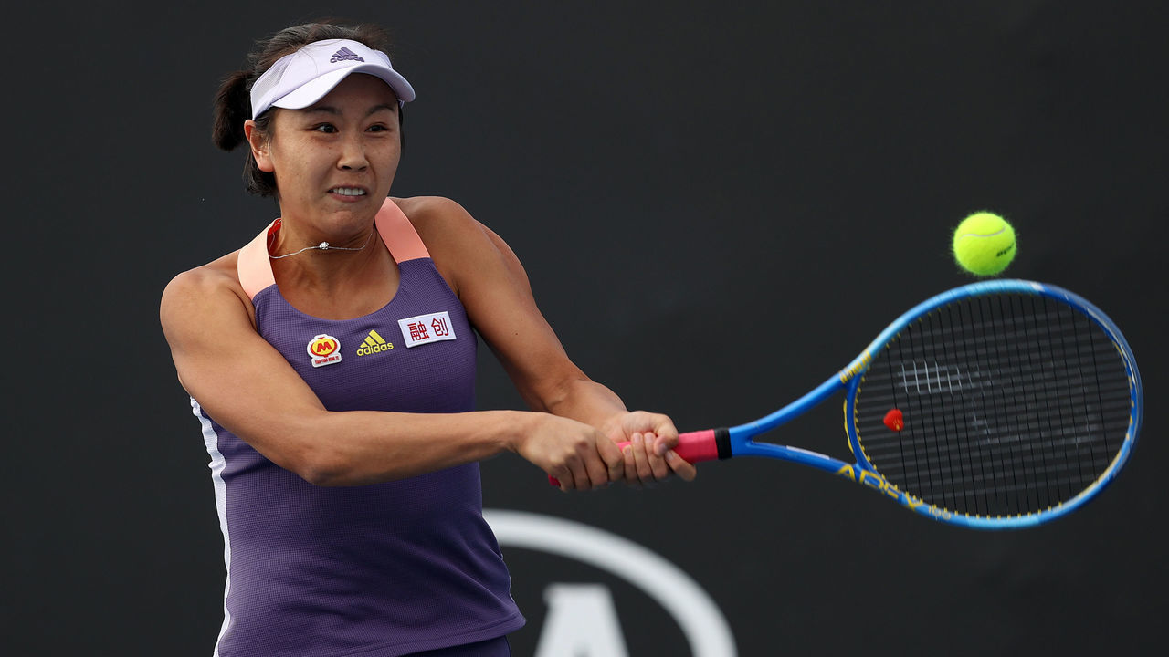 MELBOURNE, AUSTRALIA - JANUARY 23: Shuai Peng of China plays a backhand during her Women's Doubles first round match with partner Shuai Zhang of China against Veronika Kudermetova of Russia and Alison Riske of the United States on day four of the 2020 Australian Open at Melbourne Park on January 23, 2020 in Melbourne, Australia.