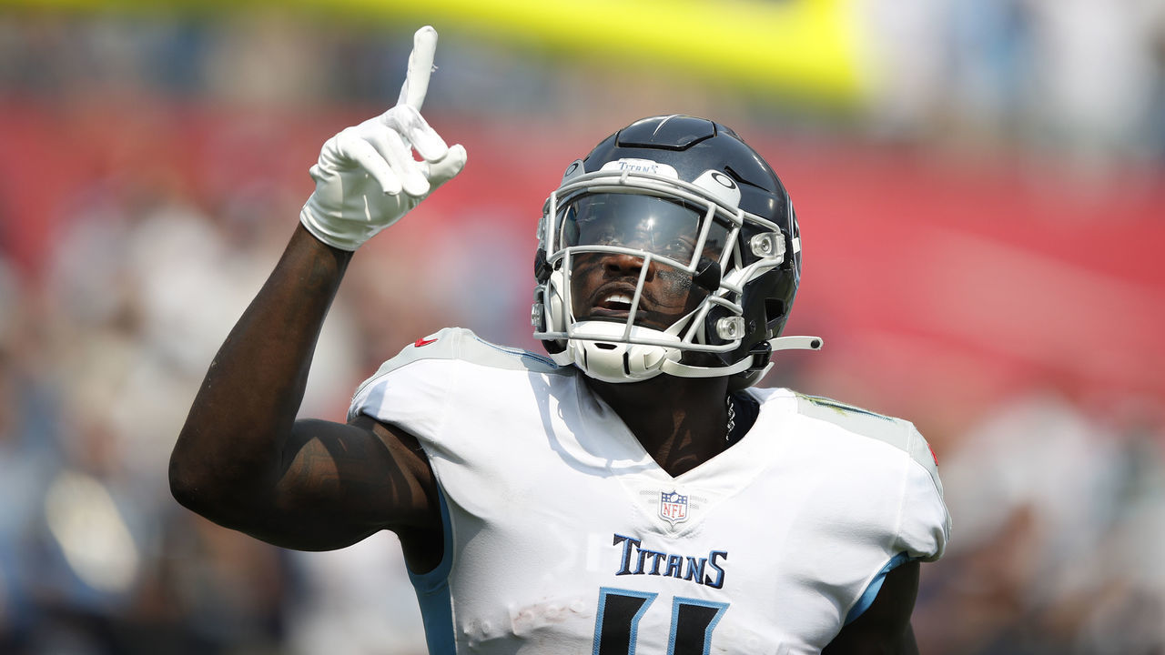 NASHVILLE, TENNESSEE - SEPTEMBER 12: A.J. Brown #11 of the Tennessee Titans celebrates after his touchdown catch against the Arizona Cardinals during the third quarter at Nissan Stadium on September 12, 2021 in Nashville, Tennessee.