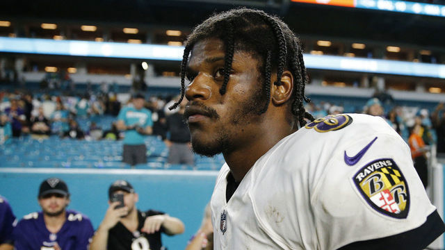 MIAMI GARDENS, FLORIDA - NOVEMBER 11: Lamar Jackson #8 of the Baltimore Ravens reacts after losing to the Miami Dolphins 22-10 at Hard Rock Stadium on November 11, 2021 in Miami Gardens, Florida.