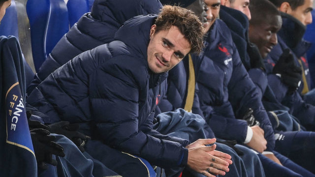 France's forward Antoine Griezmann reacts on the bench after the FIFA World Cup Qatar 2022 qualification Group D football match between Finland and France at the Olympic Stadium in Helsinki, on November 16, 2021.