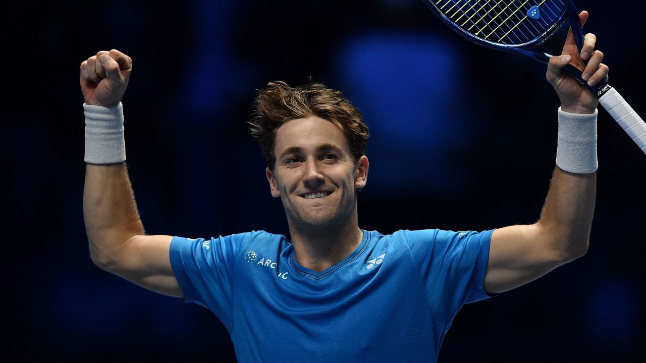 Norway's Casper Ruud celebrates defeating Russia's Andrey Rublev during their first round singles match of the ATP Finals at the Pala Alpitour venue in Turin on November 19, 2021.