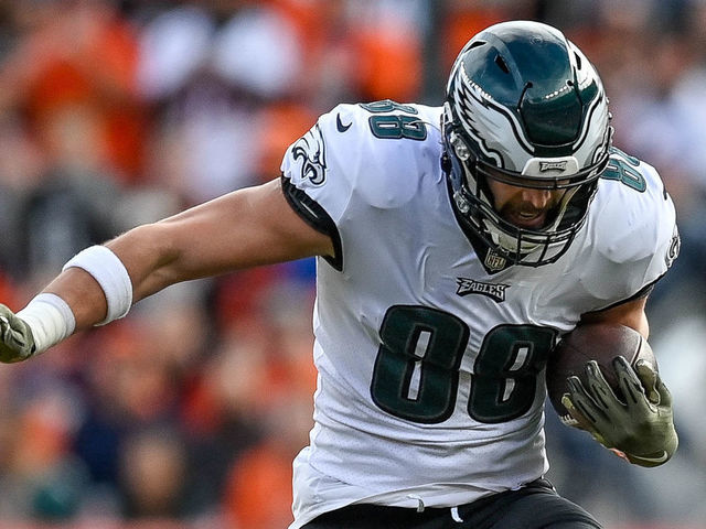DENVER, CO - NOVEMBER 14: Philadelphia Eagles tight end Dallas Goedert (88) is tackled by Denver Broncos cornerback Ronald Darby (21) during a game between the Denver Broncos and the Philadelphia Eagles at Empower Field at Mile High on November 14, 2021 in Denver, Colorado.