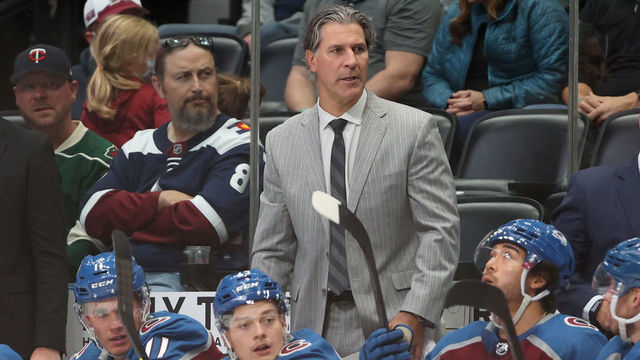 DENVER, COLORADO - SEPTEMBER 30: Head coach Jared Bednar of the Colorado Avalanche watches as his team plays the Minnesota Wild in the second period at Ball Arena on September 30, 2021 in Denver, Colorado.