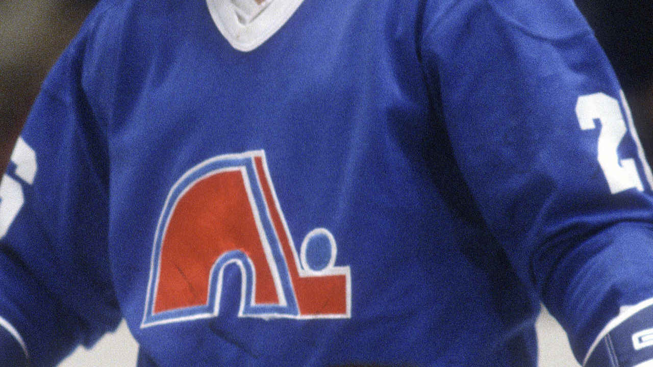 NEW YORK - CIRCA 1982: Peter Stastny #26 of the Quebec Nordiques looks on against the New York Rangers during an NHL Hockey game circa 1982 at Madison Square Garden in the Manhattan borough of New York City. Stastny's playing career went from 1975-95.