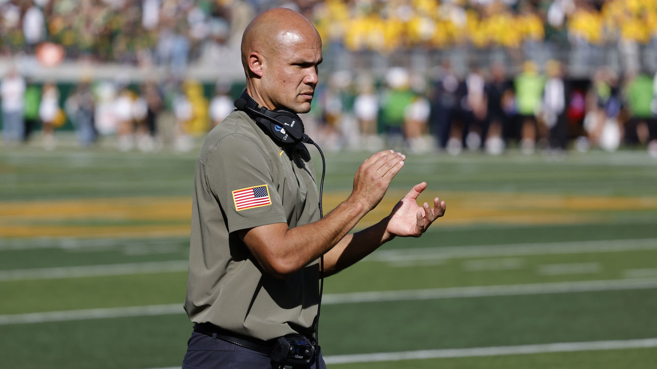 WACO, TX - NOVEMBER 13: Head coach Dave Aranda of the Baylor Bears applauds his players as they take on the Oklahoma Sooners in the second half at McLane Stadium on November 13, 2021 in Waco, Texas. Baylor won 27-14.