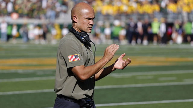 WACO, TX - NOVEMBER 13: Head coach Dave Aranda of the Baylor Bears applauds his players as they take on the Oklahoma Sooners in the second half at McLane Stadium on November 13, 2021 in Waco, Texas. Baylor won 27-14.