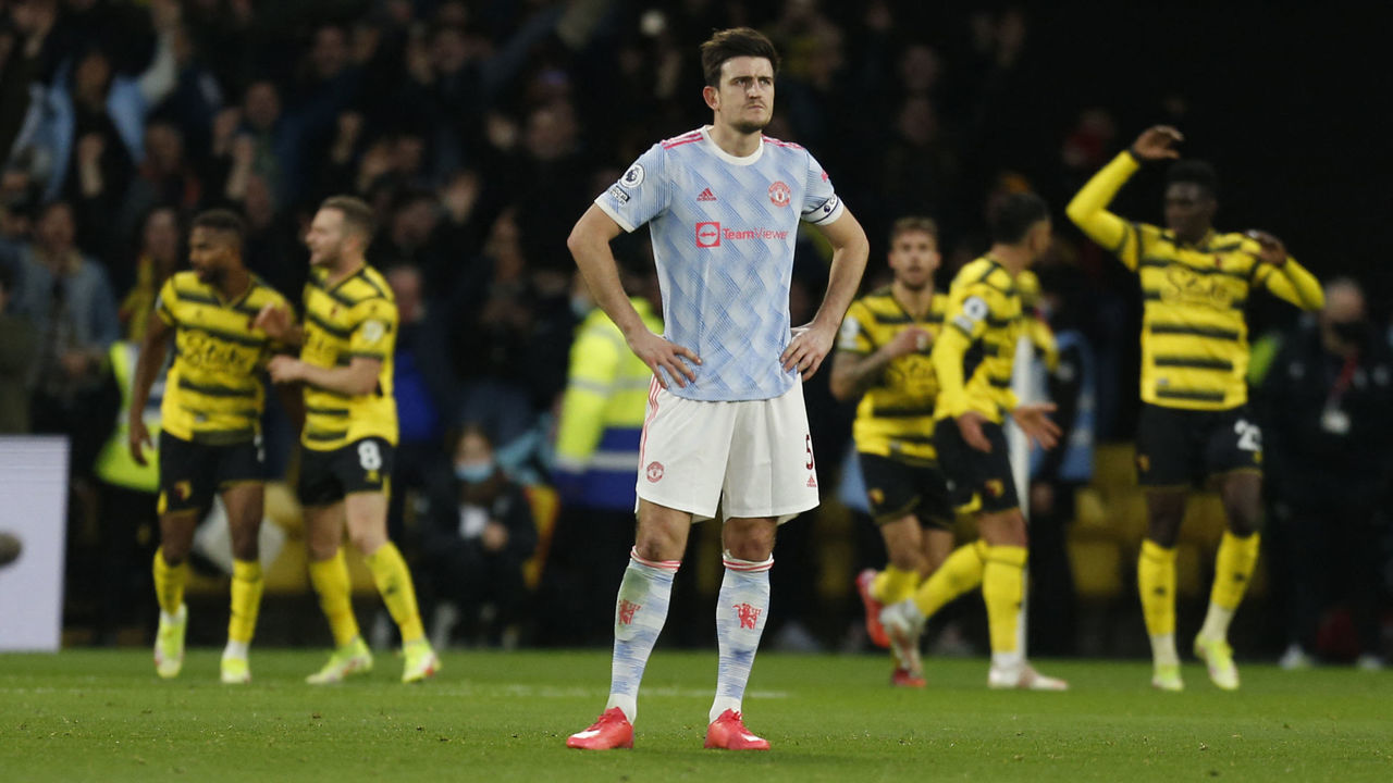 Manchester United's English defender Harry Maguire reacts during the English Premier League football match between Watford and Manchester United at Vicarage Road Stadium in Watford, southeast England, on November 20, 2021. - RESTRICTED TO EDITORIAL USE. No use with unauthorized audio, video, data, fixture lists, club/league logos or 'live' services. Online in-match use limited to 120 images. An additional 40 images may be used in extra time. No video emulation. Social media in-match use limited to 120 images. An additional 40 images may be used in extra time. No use in betting publications, games or single club/league/player publications.