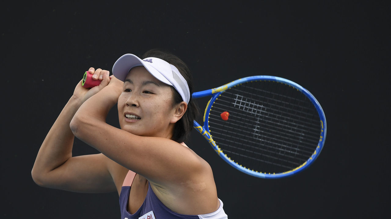 MELBOURNE, AUSTRALIA - JANUARY 21: Shuai Peng of China in action during her Women's Singles first round match against Nao Hibino of Japan on day two of the 2020 Australian Open at Melbourne Park on January 21, 2020 in Melbourne, Australia.