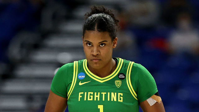 SAN ANTONIO, TEXAS - MARCH 28: Nyara Sabally #1 of the Oregon Ducks reacts in the first half against the Louisville Cardinals during the Sweet Sixteen round of the NCAA Women's Basketball Tournament at the Alamodome on March 28, 2021 in San Antonio, Texas.