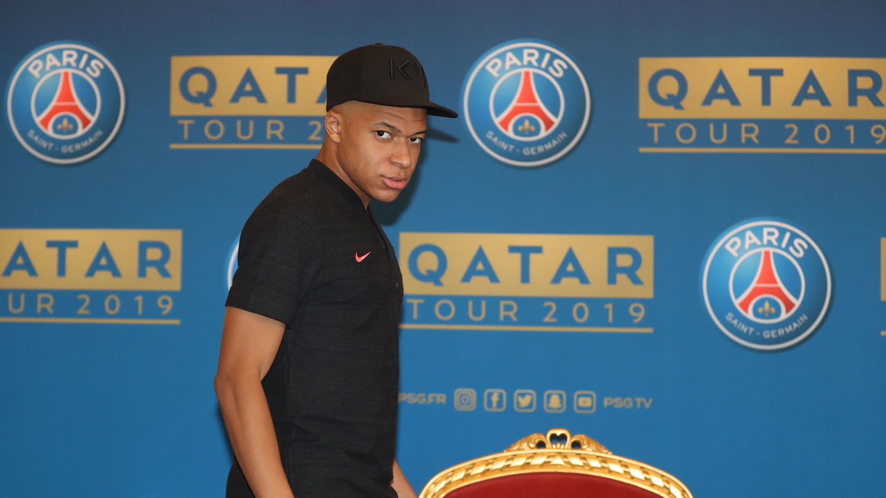 Paris Saint-Germain's French forward Kylian Mbappe arrives to a press conference on January 14, 2019 in Doha as the team (PSG) start their winter training camp in the Qatari capital.