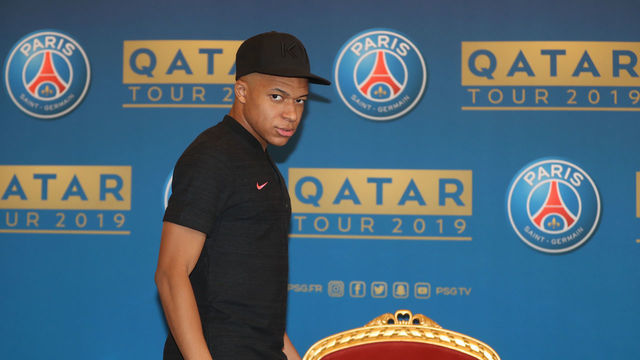Paris Saint-Germain's French forward Kylian Mbappe arrives to a press conference on January 14, 2019 in Doha as the team (PSG) start their winter training camp in the Qatari capital.