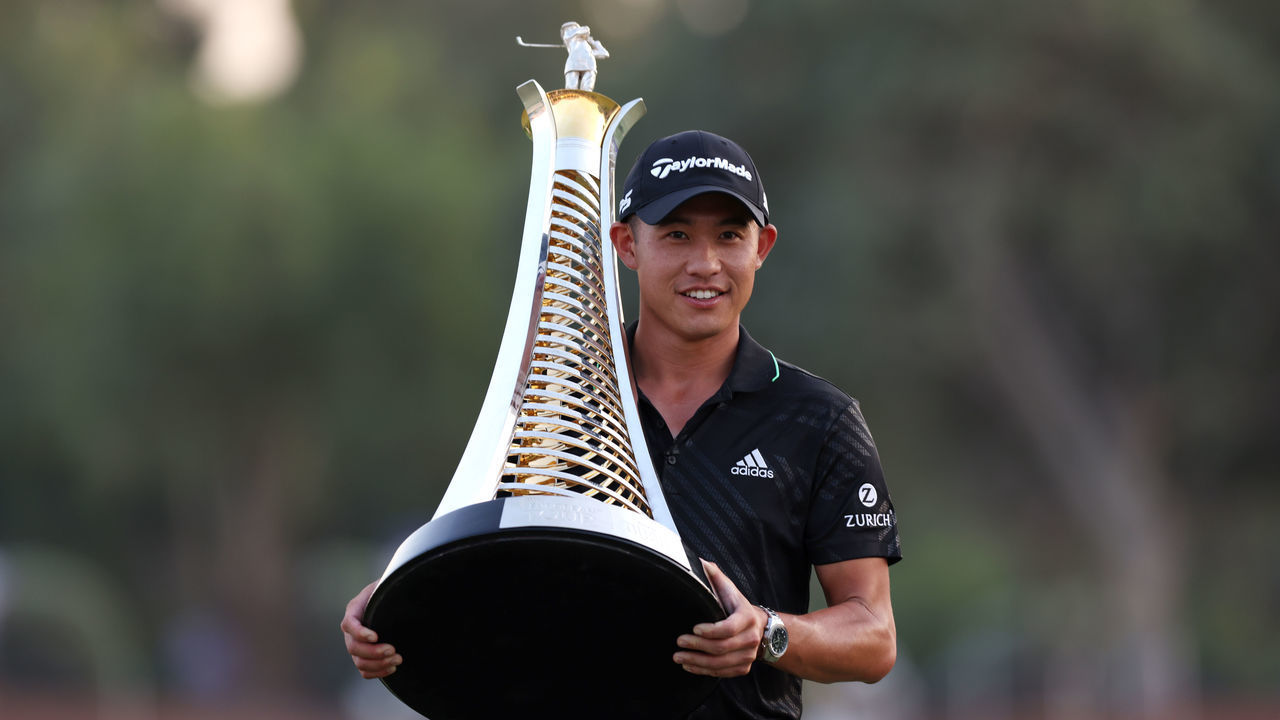 DUBAI, UNITED ARAB EMIRATES - NOVEMBER 21: Collin Morikawa of United States with The Race to Dubai trophy as he wins The DP World Tour Championship and The Race to Dubai during Day Four of The DP World Tour Championship at Jumeirah Golf Estates on November 21, 2021 in Dubai, United Arab Emirates.