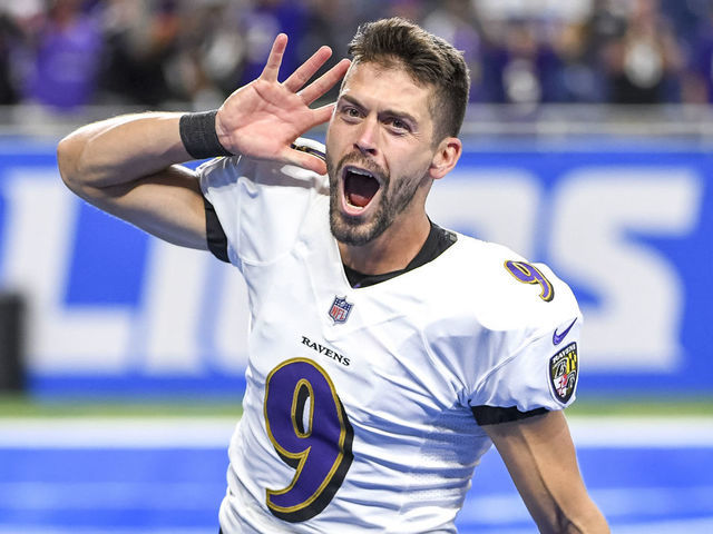 DETROIT, MICHIGAN - SEPTEMBER 26: Justin Tucker #9 of the Baltimore Ravens celebrates the winning field goal at the end of the game against the Detroit Lions at Ford Field on September 26, 2021 in Detroit, Michigan. Justin Tucker set an NFL record with his 66-yard game-winning field goal. "n