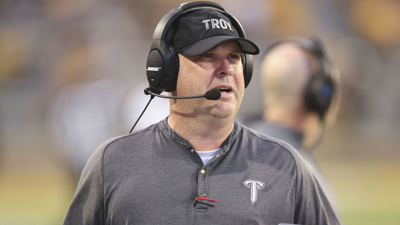 HATTIESBURG, MS - SEPTEMBER 18: Troy Trojans head coach Chip Lindsey watches a replay on the video board during the Troy Trojans game versus the Southern Miss Golden Eagles on September 18, 2021, at M.M. Roberts Stadium in Hattiesburg, Mississippi.