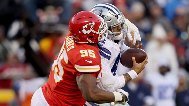 KANSAS CITY, MISSOURI - NOVEMBER 21: Chris Jones #95 of the Kansas City Chiefs sacks Dak Prescott #4 of the Dallas Cowboys in the second quarter of the game at Arrowhead Stadium on November 21, 2021 in Kansas City, Missouri.