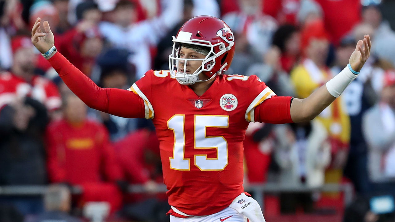 KANSAS CITY, MO - NOVEMBER 21: Kansas City Chiefs quarterback Patrick Mahomes (15) runs with his hands raised after a 1-yard touchdown run by teammate Clyde Edwards-Helaire (25) in the second quarter of an NFL football game between the Dallas Cowboys and Kansas City Chiefs on Nov 21, 2021 at GEHA Field at Arrowhead Stadium in Kansas City, MO.