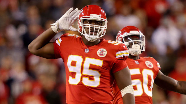 KANSAS CITY, MISSOURI - NOVEMBER 21: Chris Jones #95 and Willie Gay #50 of the Kansas City Chiefs rile up the fans in the fourth quarter against the Dallas Cowboys at Arrowhead Stadium on November 21, 2021 in Kansas City, Missouri.
