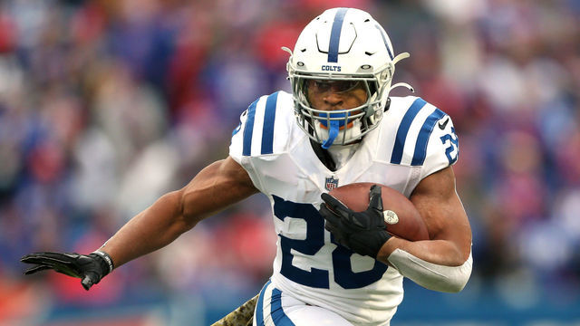 ORCHARD PARK, NEW YORK - NOVEMBER 21: Jonathan Taylor #28 of the Indianapolis Colts runs the ball in the game against the Buffalo Bills during the first quarter at Highmark Stadium on November 21, 2021 in Orchard Park, New York.