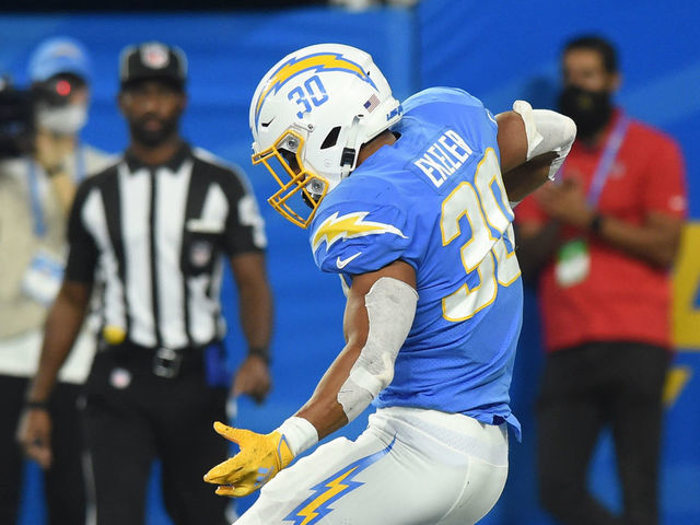 INGLEWOOD, CA - NOVEMBER 21: Los Angeles Chargers Running Back Austin Ekeler (30) celebrates after running for a touchdown during an NFL game between the Pittsburgh Steelers and the Los Angeles Chargers on November 21, 2021, at SoFi Stadium in Inglewood, CA.