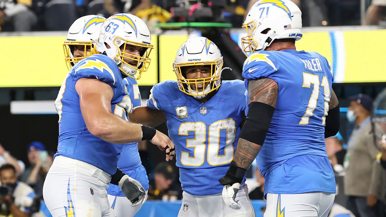 INGLEWOOD, CALIFORNIA - NOVEMBER 21: Austin Ekeler #30 of the Los Angeles Chargers celebrates with teammates after scoring a touchdown against the Pittsburgh Steelers at SoFi Stadium on November 21, 2021 in Inglewood, California.