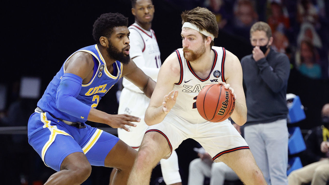 INDIANAPOLIS, INDIANA - APRIL 03: Cody Riley #2 of the UCLA Bruins defends Drew Timme #2 of the Gonzaga Bulldogs in the second half during the 2021 NCAA Final Four semifinal at Lucas Oil Stadium on April 03, 2021 in Indianapolis, Indiana.