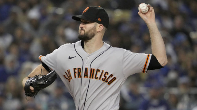 Los Angeles, CA - October 11: Starting pitcher Alex Wood #57 of the San Francisco Giants throws to a Los Angeles Dodgers batter during the first inning of the National League Division Series baseball game at Dodger Stadium in Los Angeles on Monday, October 11, 2021.