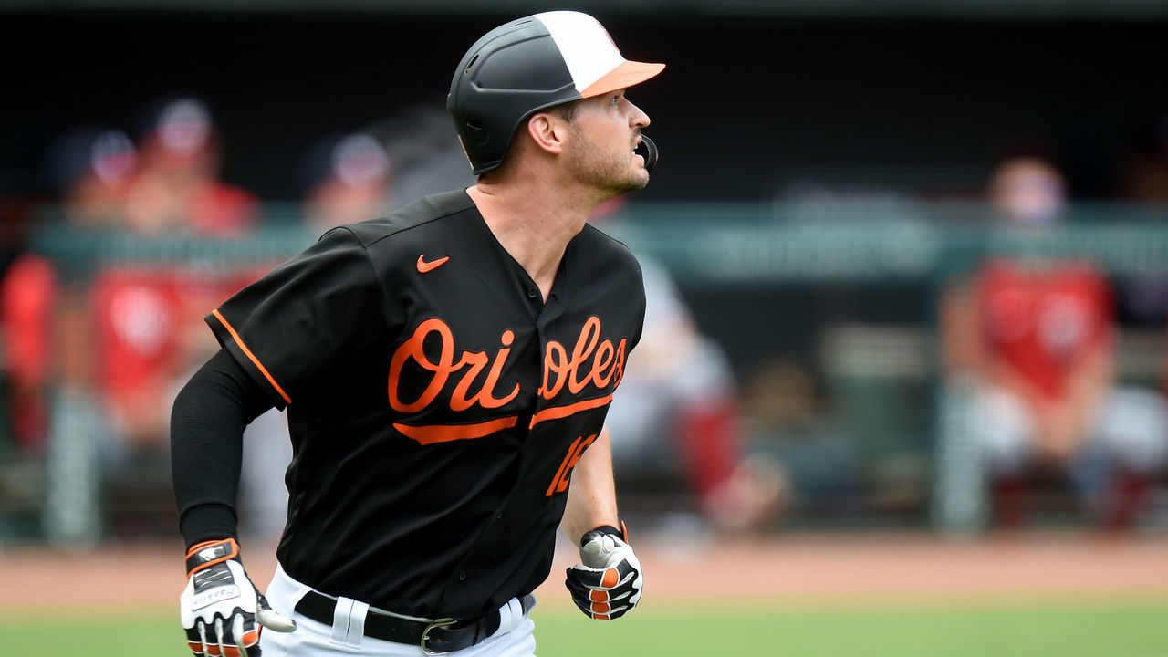 BALTIMORE, MARYLAND - JULY 25: Trey Mancini #16 of the Baltimore Orioles rounds the bases after hitting a home run against the Washington Nationals at Oriole Park at Camden Yards on July 25, 2021 in Baltimore, Maryland.